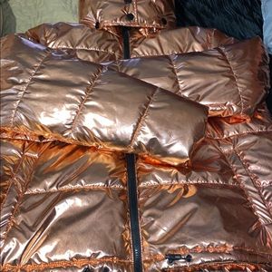 Metallic rose gold women’s Mod X puffer coat size XL.